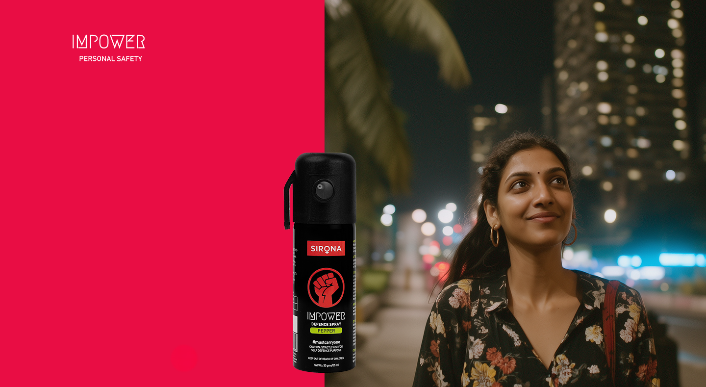 Woman walking at night with a can of Sirona pepper spray 