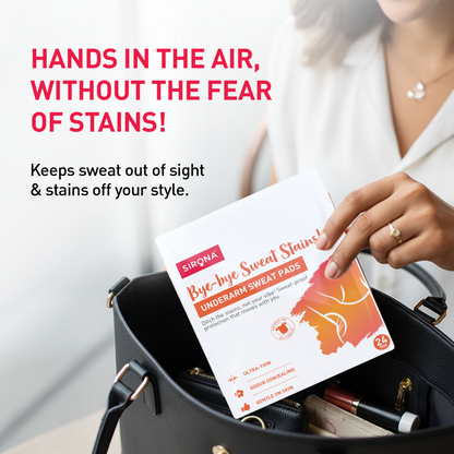 Person holding a package of Sirona  underarm sweat pads 